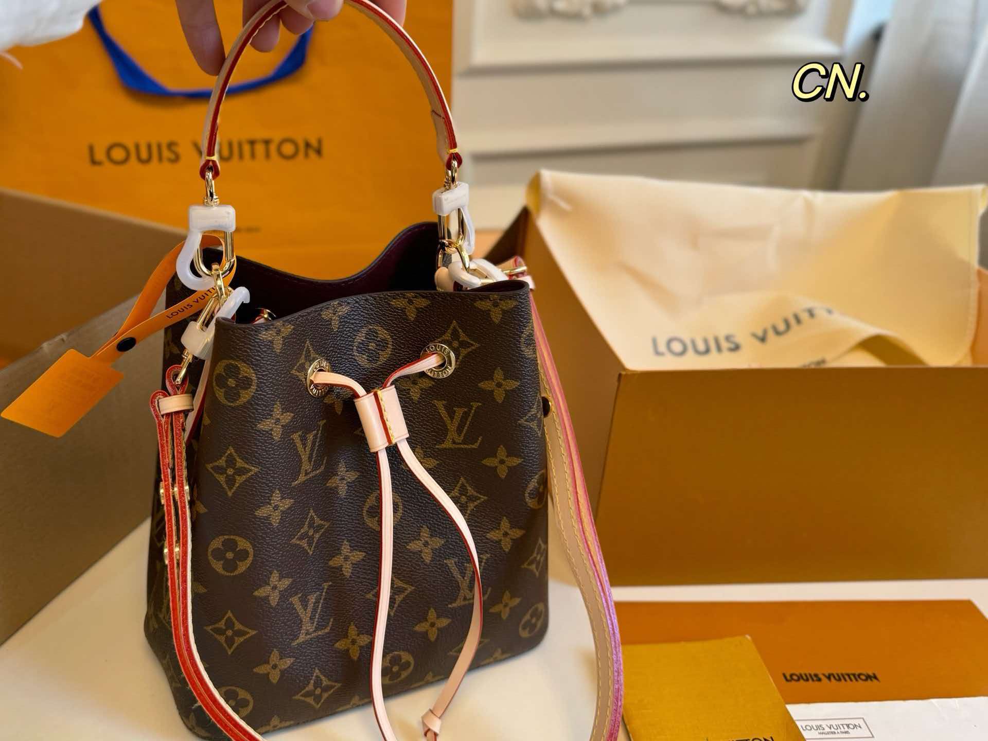 Monogram LV Néonoé BB mini bucket bag with drawstring closure, adjustable leather shoulder strap and polished gold‑tone hardware