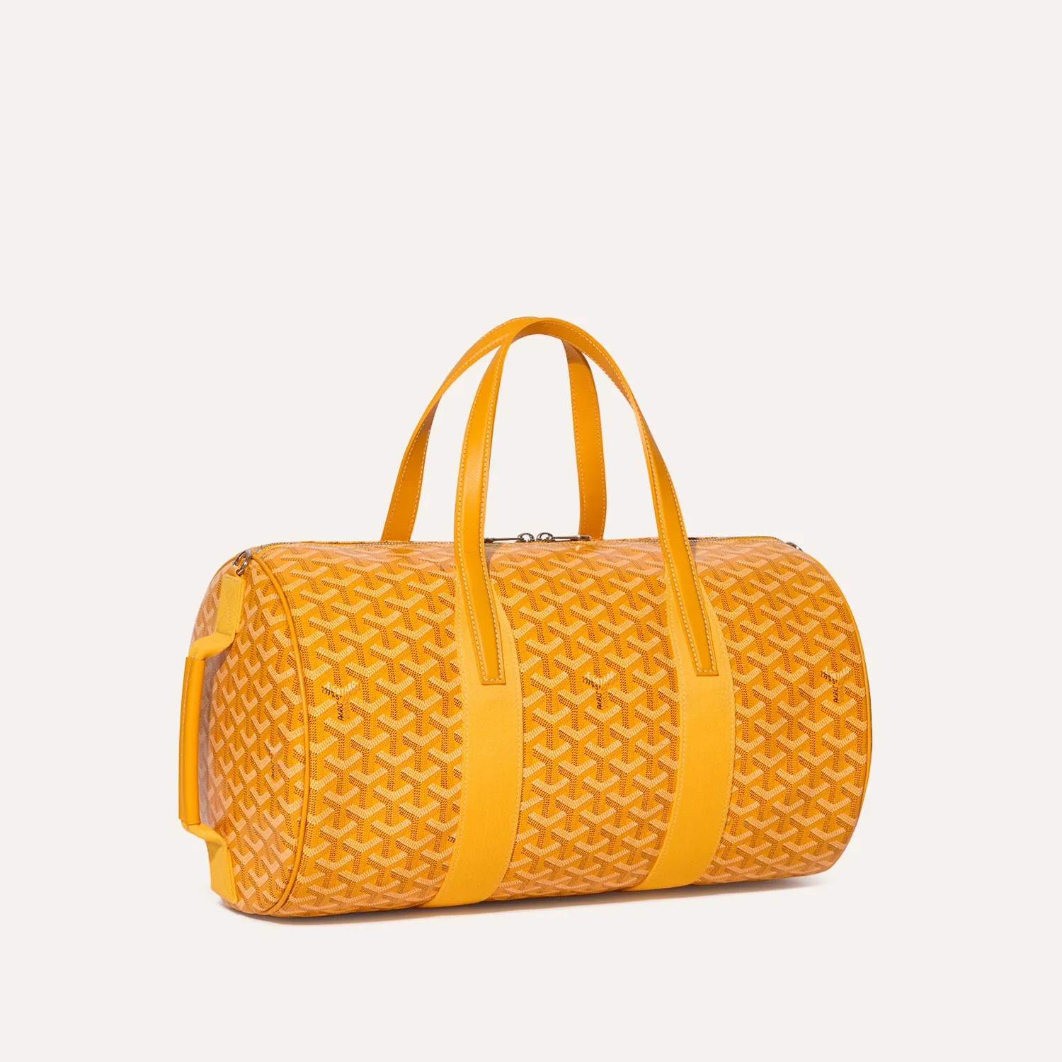 Goyard Barrel 40 green barrel‑shaped travel duffle bag, durable canvas, leather trim and premium metal hardware