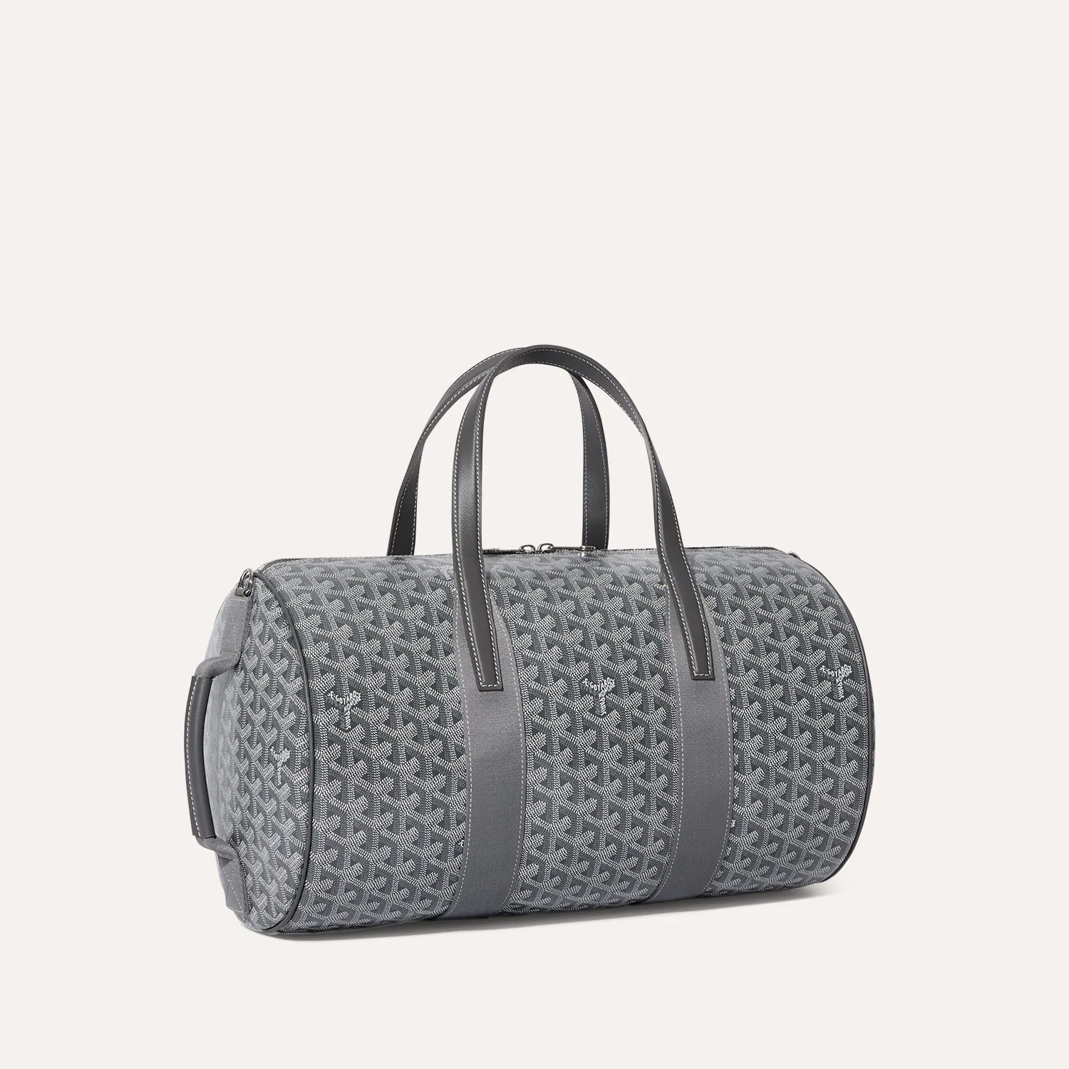 Goyard Barrel 40 green barrel‑shaped travel duffle bag, durable canvas, leather trim and premium metal hardware