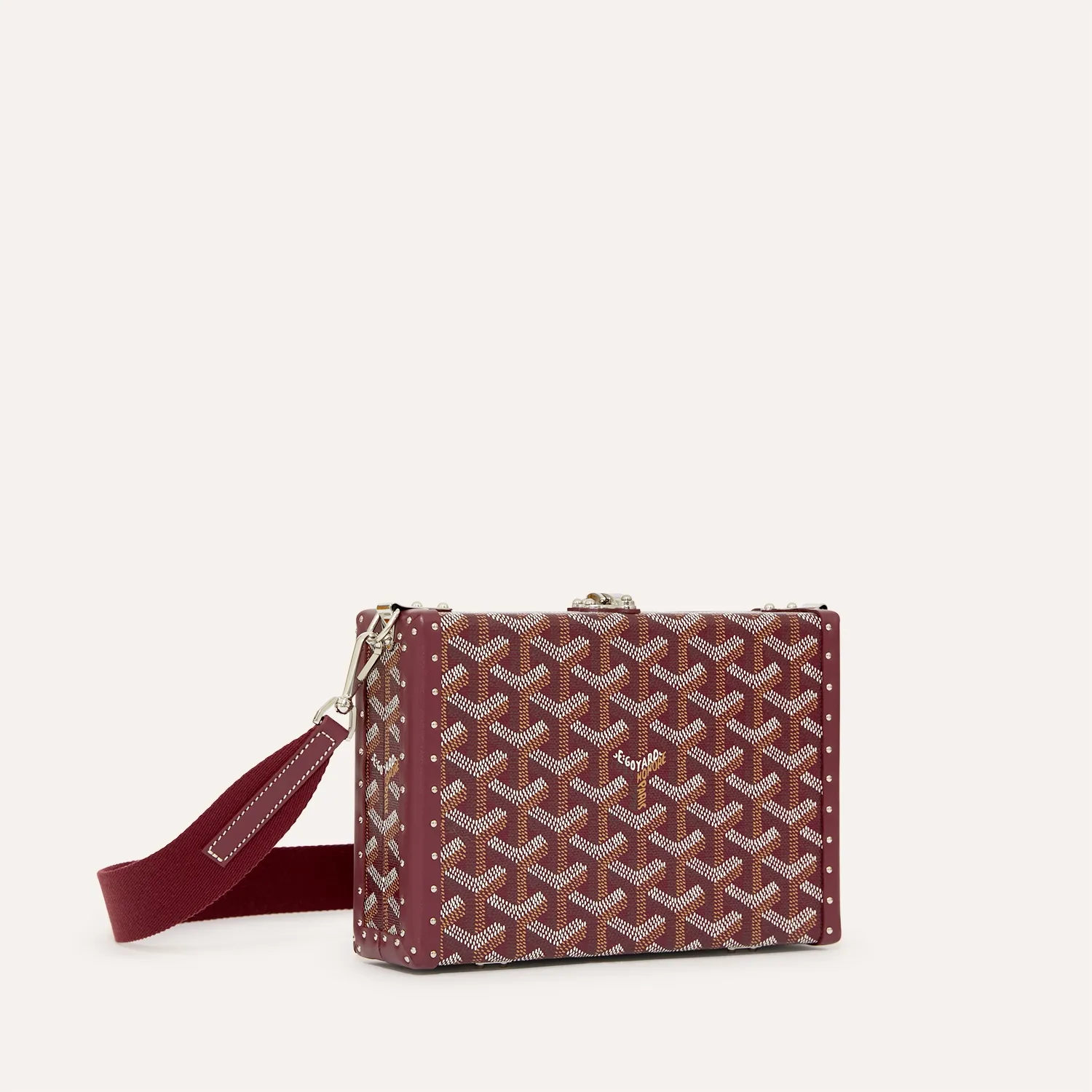Goyard Bezons PM green trunk crossbody bag, iconic goyardine canvas, calfskin trim, gold‑tone clasp, removable adjustable shoulder strap