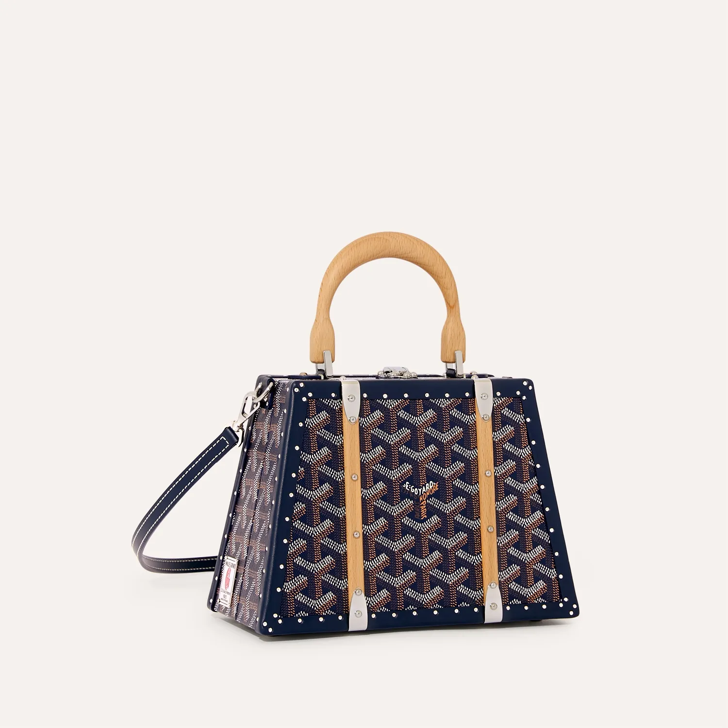 Goyard Sac Malle Saigon Mini green hard trunk bag, iconic goyardine canvas, beechwood top handle, detachable leather shoulder strap, vintage trunk rivet details