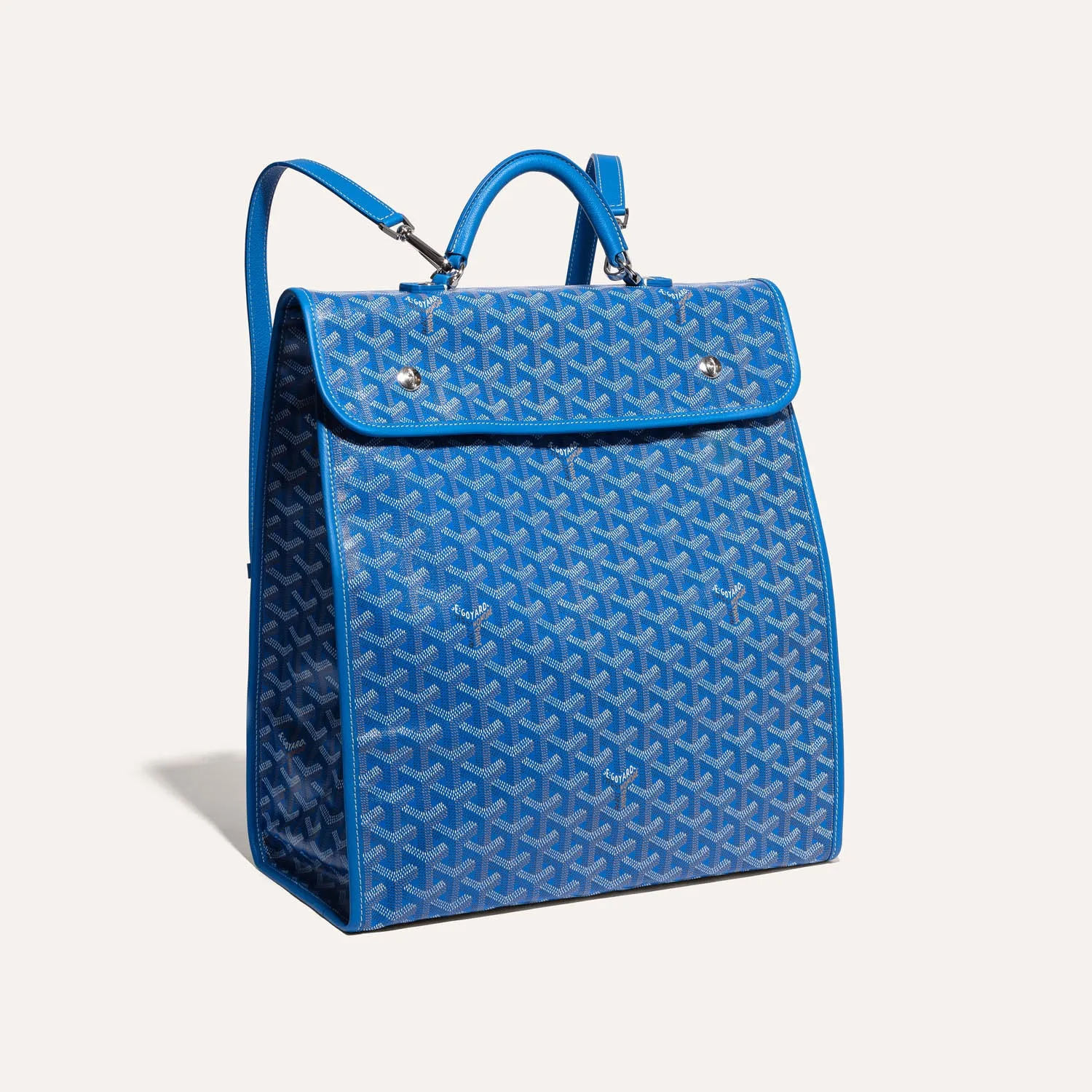 Goyard Saint Léger green flap backpack bag, iconic goyardine canvas, calfskin trim, top leather handle, adjustable shoulder straps, snap‑button flap closure